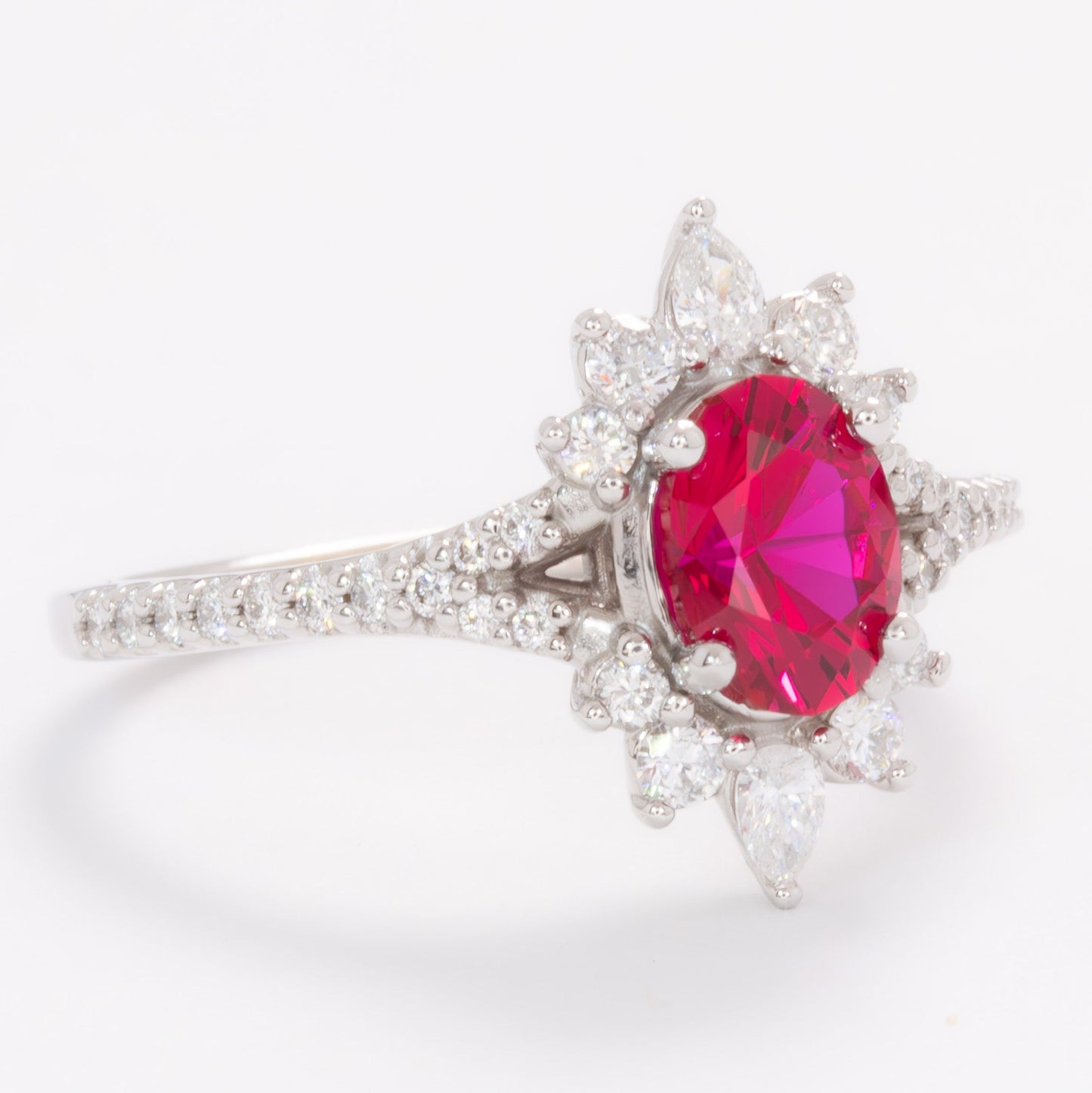 white gold luna engagement ring with oval lab ruby