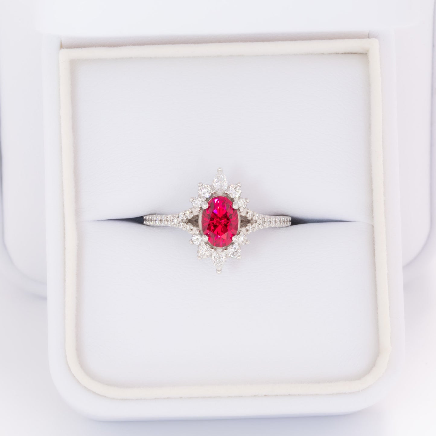 white gold luna engagement ring with oval lab ruby