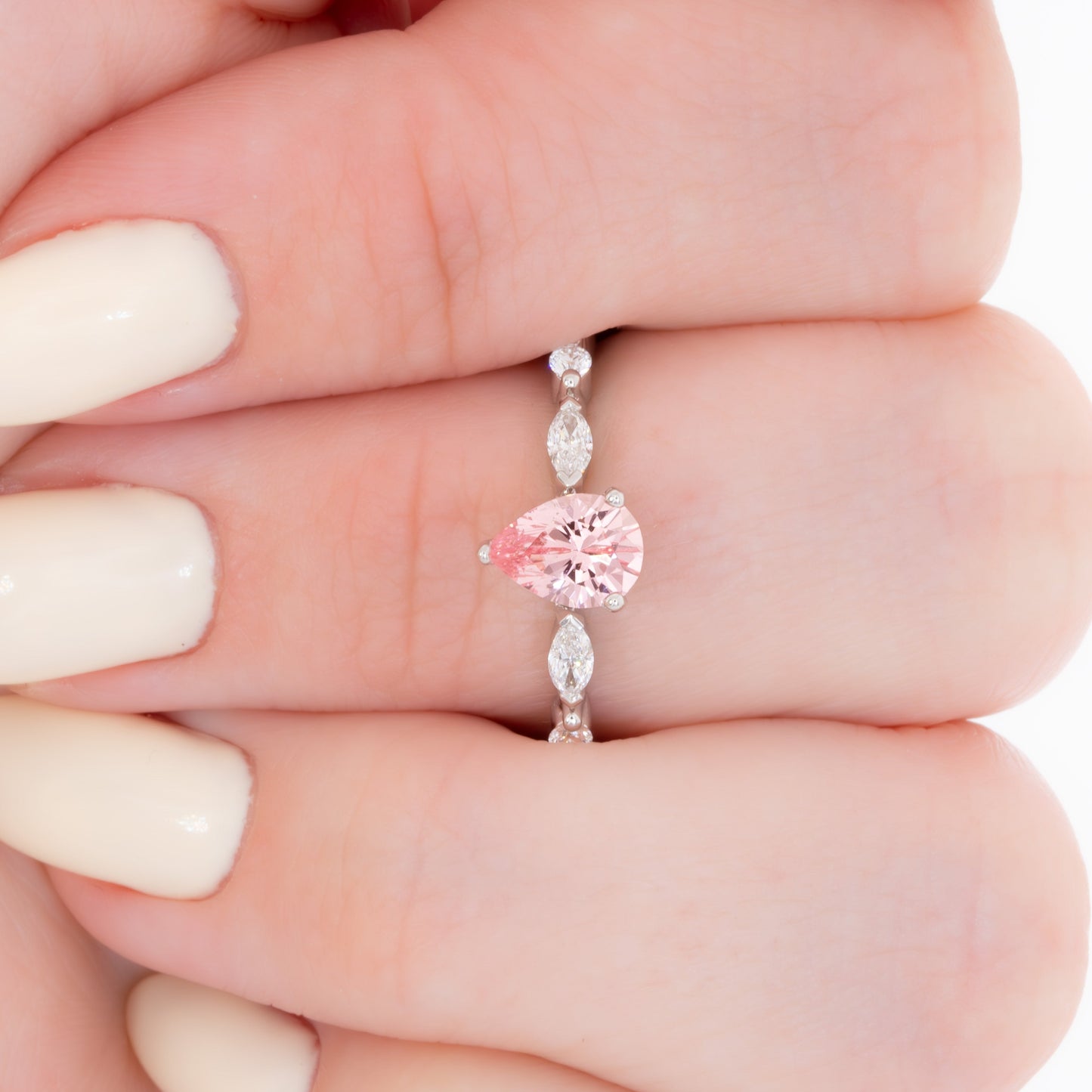 wren engagement ring in white gold with pink pear lab sapphire