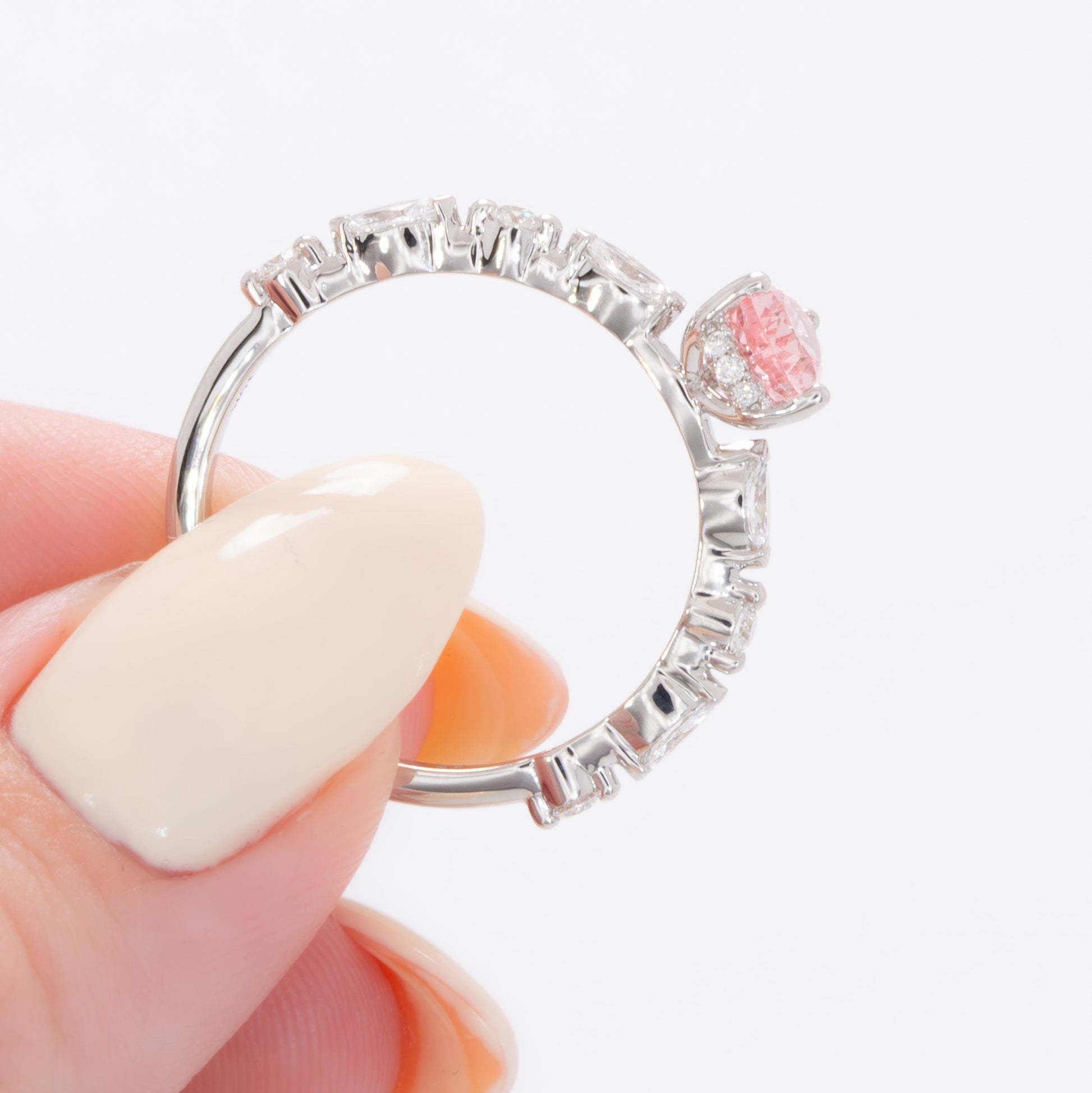 wren engagement ring in white gold with pink pear lab sapphire