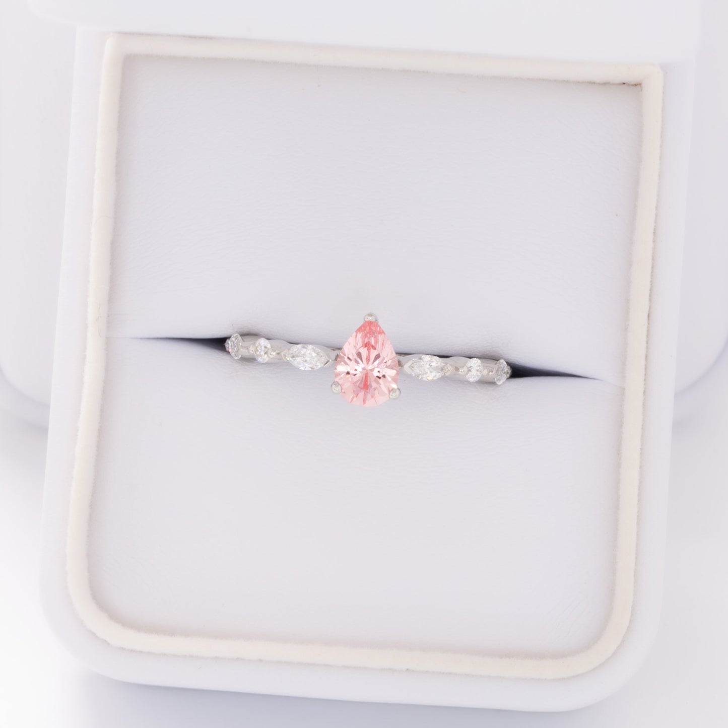 wren engagement ring in white gold with pink pear lab sapphire