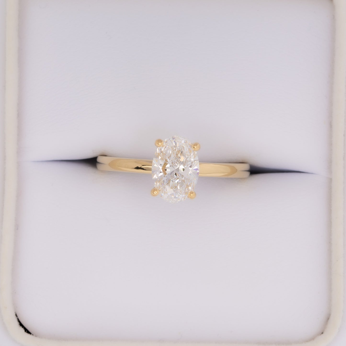 yellow gold serene solitaire with oval lab diamond