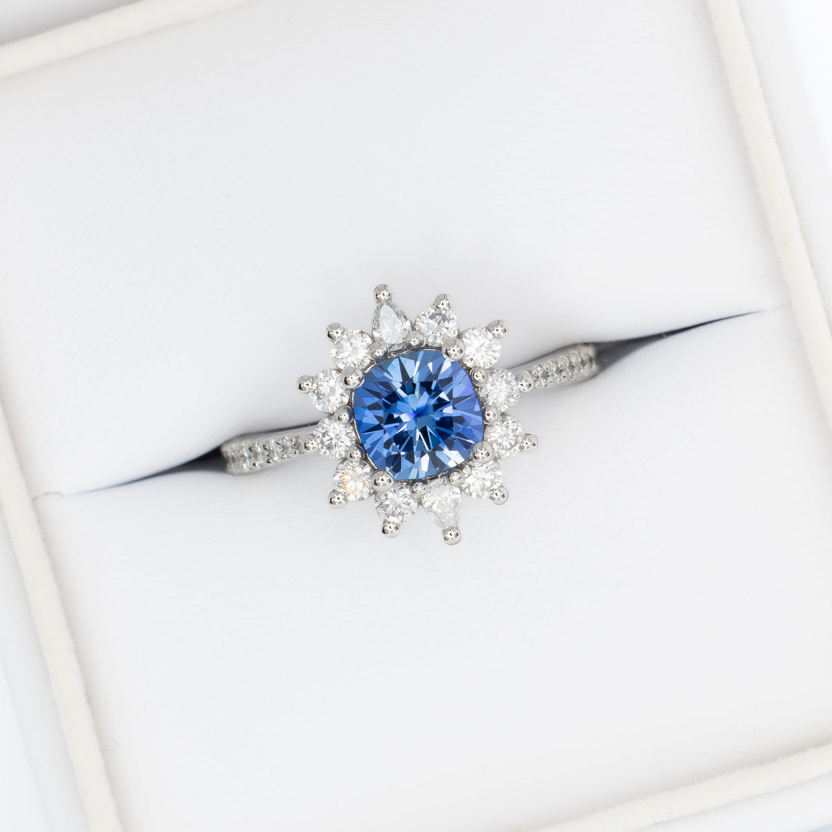 zena halo ring in platinum with cushion periwinkle lab sapphire