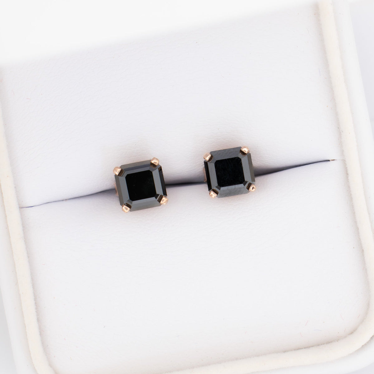 zoe earrings in rose gold with black moissanite asschers