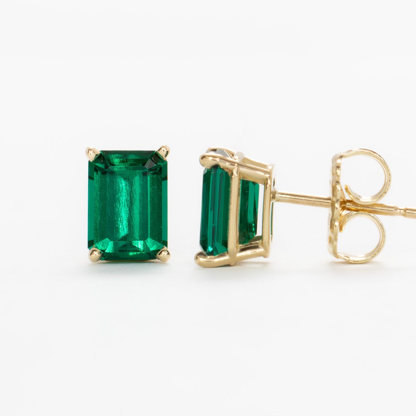 zoe earrings with lab emerald step cut