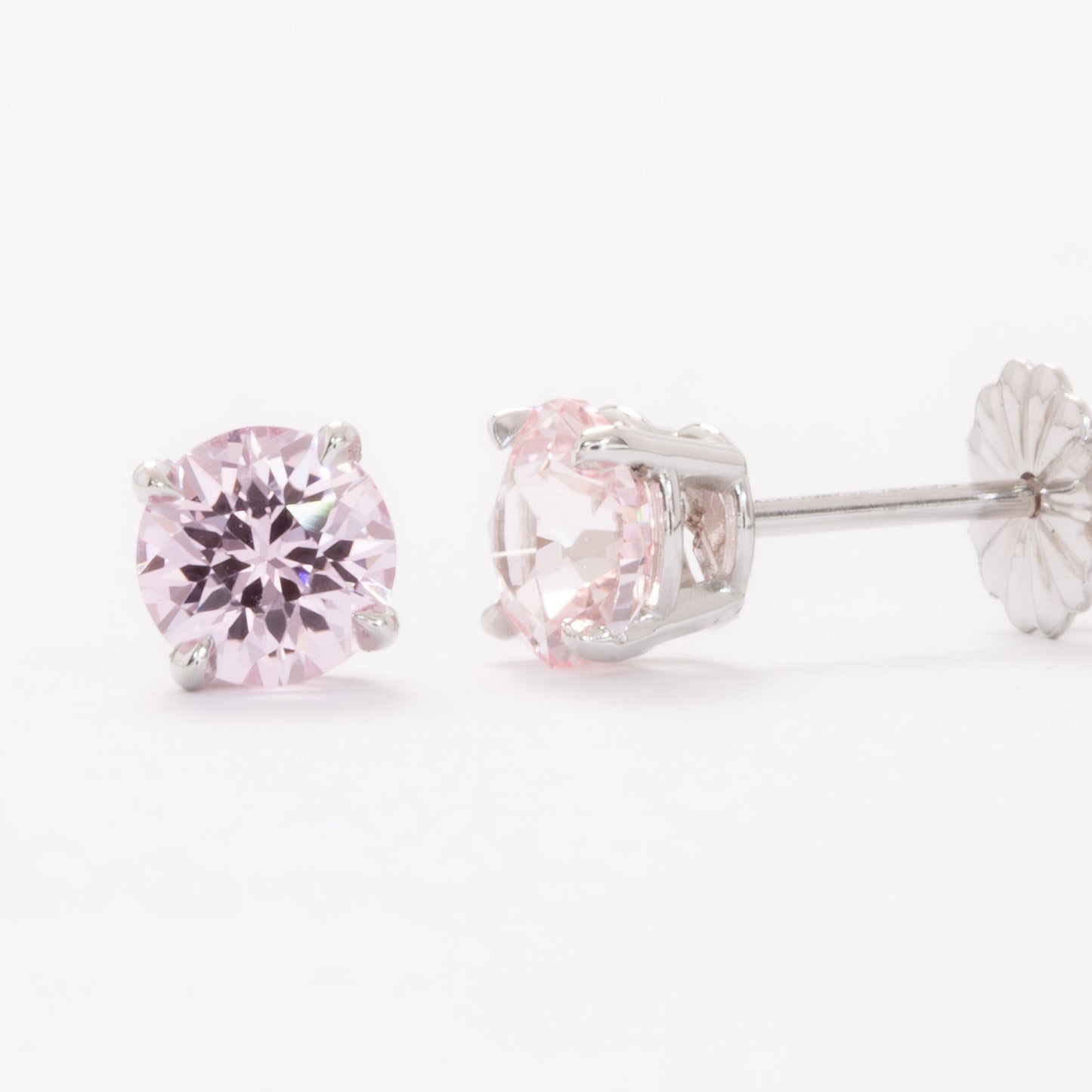 zoe earrings with peach round lab sapphires